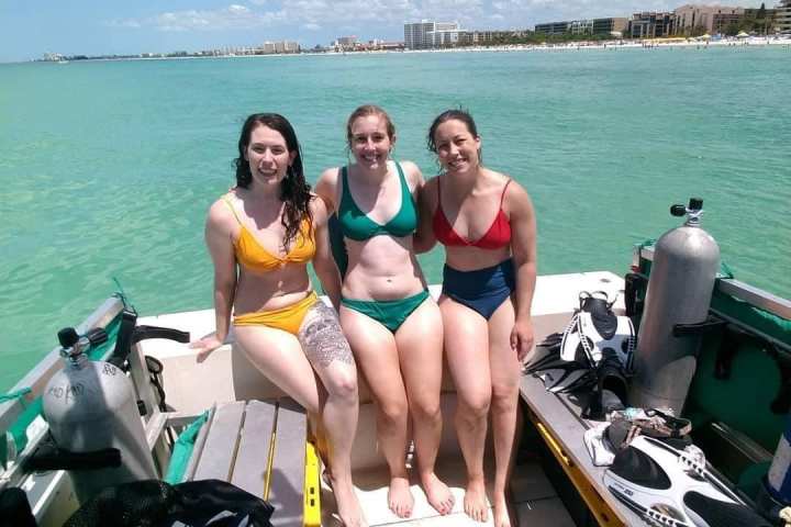 a group of people on a beach