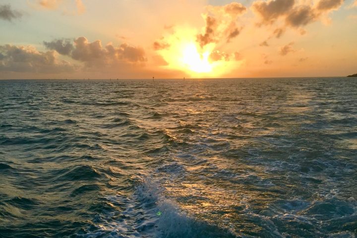 a sunset over a body of water